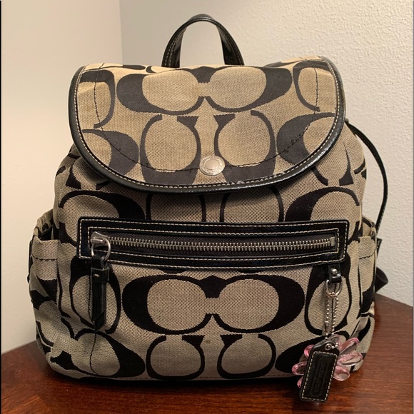 black and grey coach backpack